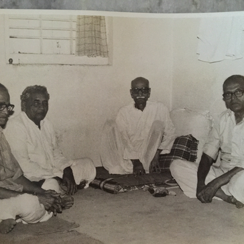 Baba with Trustees - Shri. Ghanekar, Shri. Anna Gadgil, and Shri. Bapurao Damle at Gondawale (from left to right).